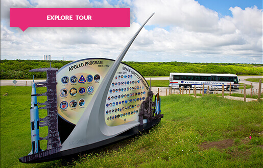 Kennedy Space Center sign and Explore Tour bus