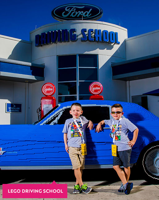 Boy driving a toy car at Legoland Florida