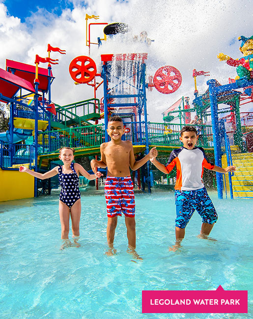 Little boy with a ball in a Legoland Florida Water Park pool